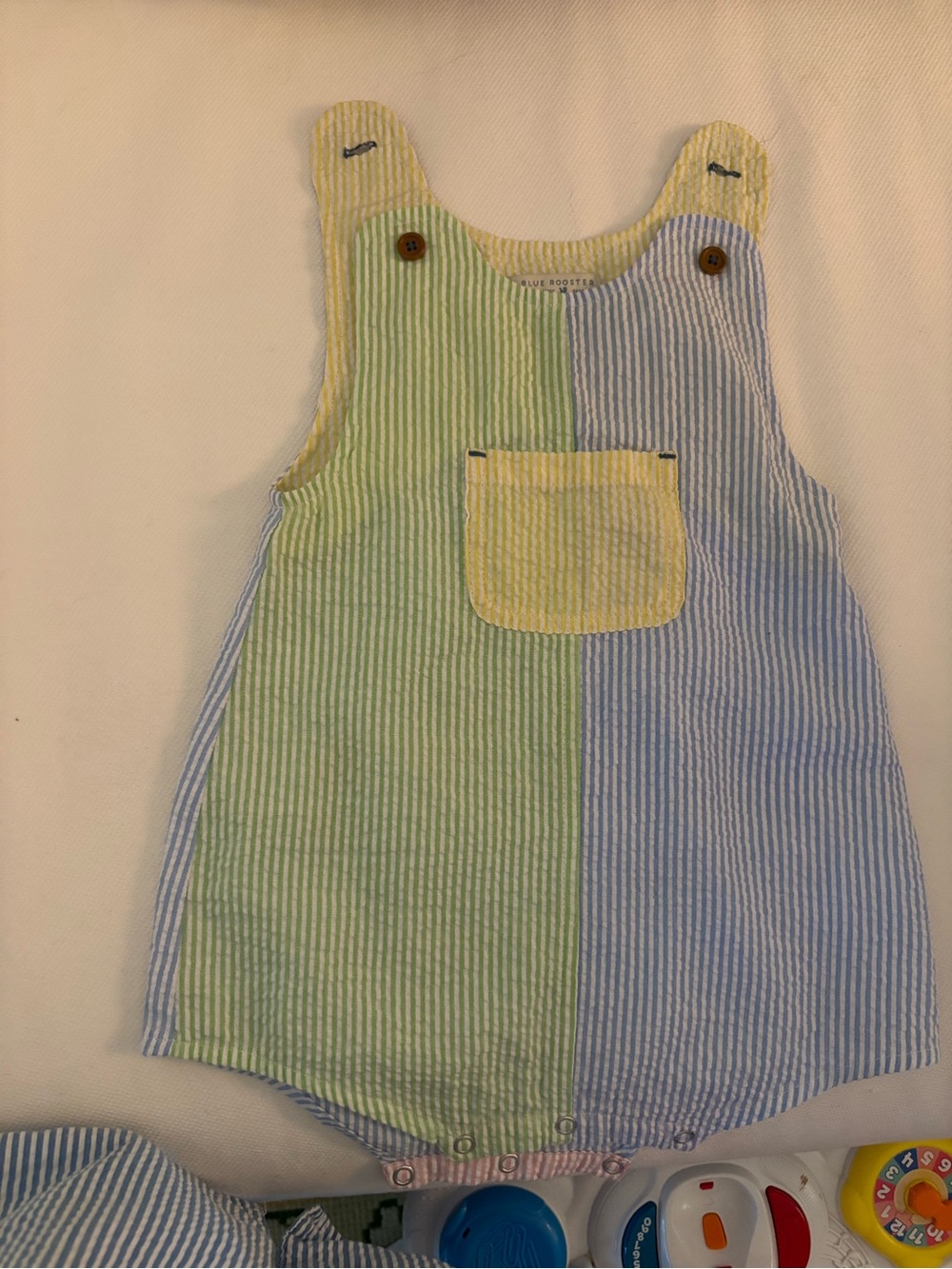Blue Rooster / Pink Chicken Kids Striped Reversible Romper in Yellow/Blue/Green